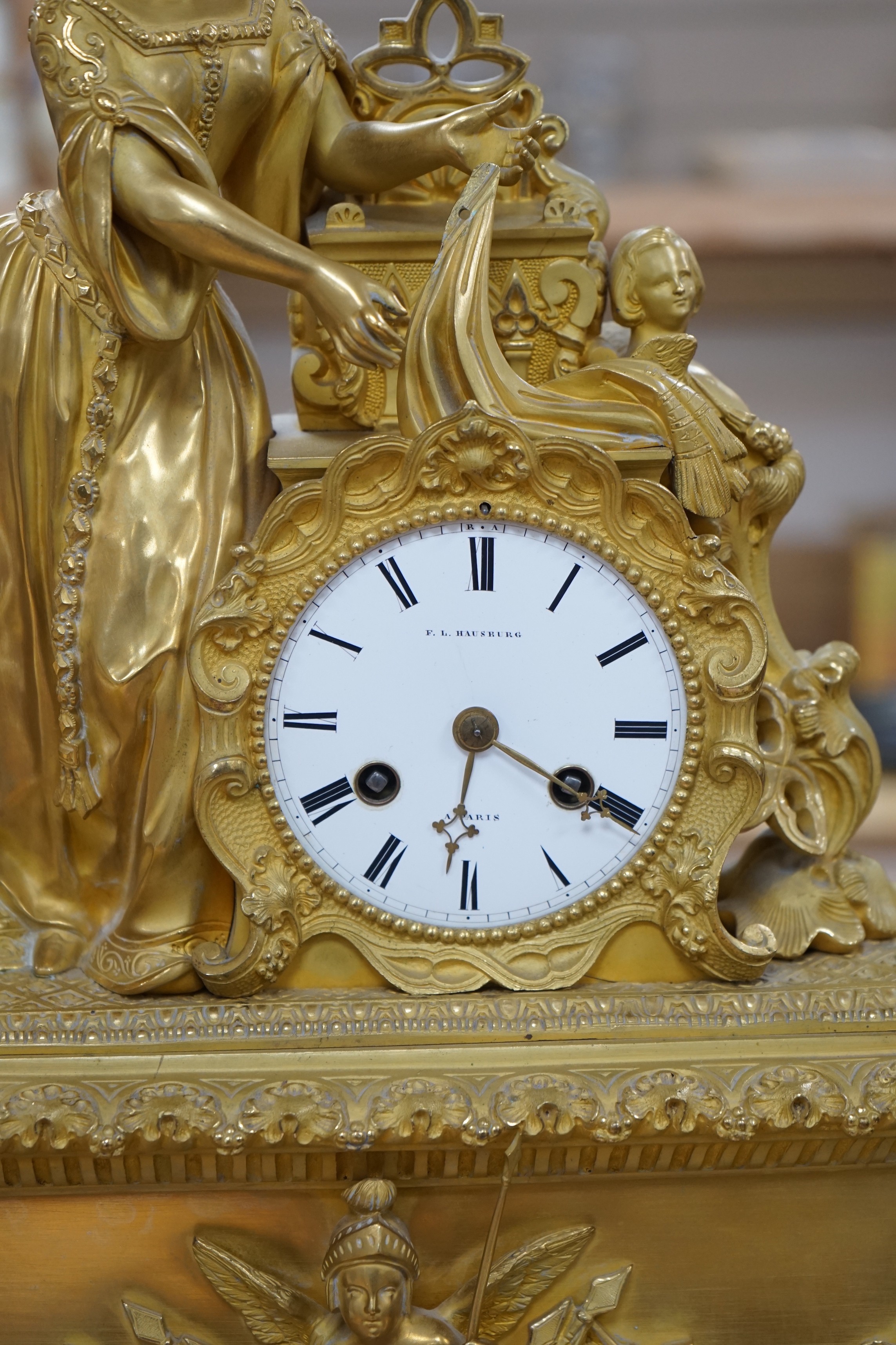 A 19th century ormolu figural French mantel clock on stand, by F.LHabsburg, Paris, 59cms high